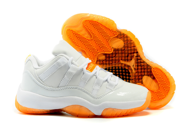 orange and white low top 11s