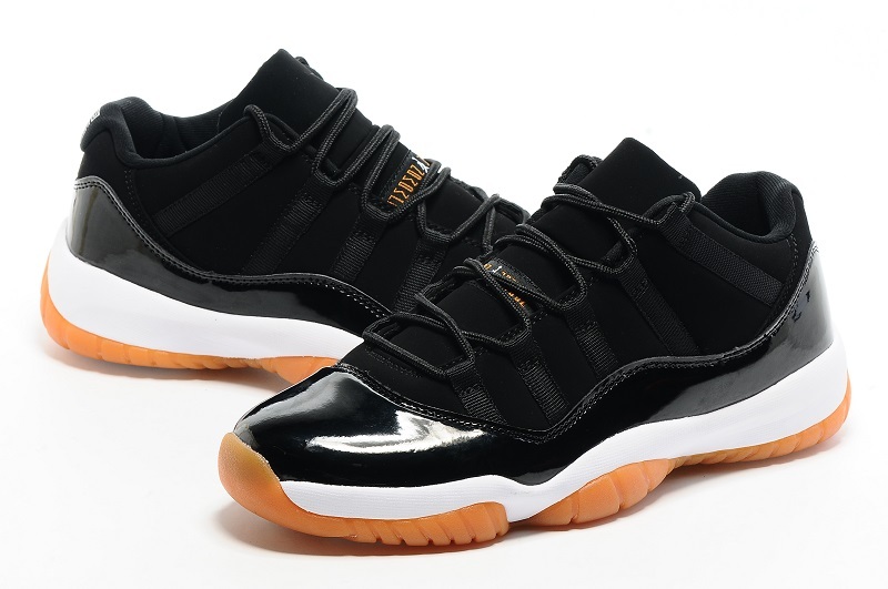 orange and black jordans 11